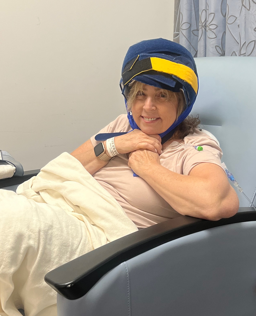 Carolyn Nickels wearing a cold cap while receiving chemotherapy
