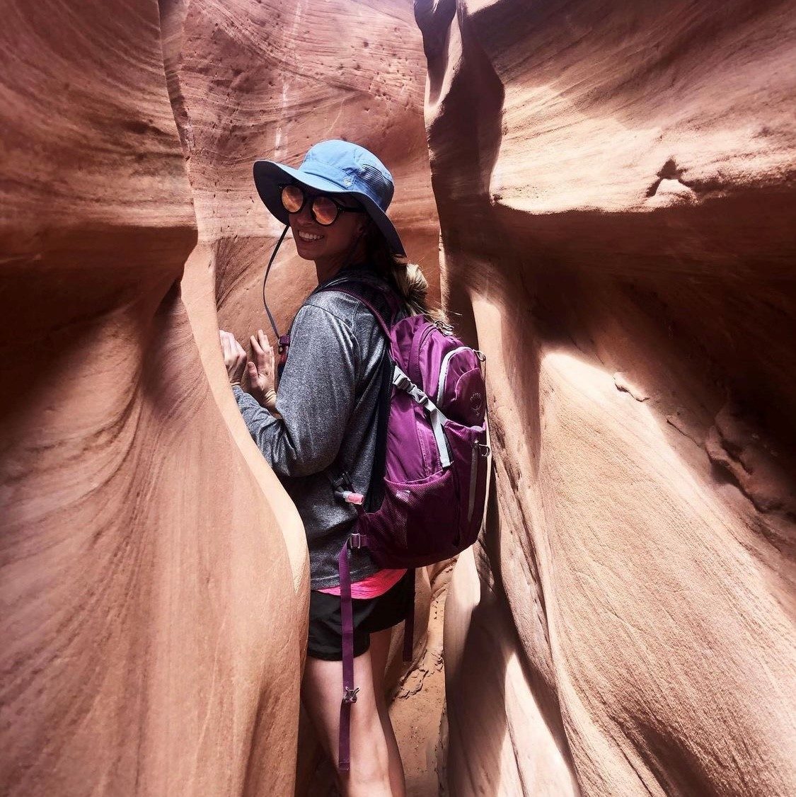 Women hiking through canyon