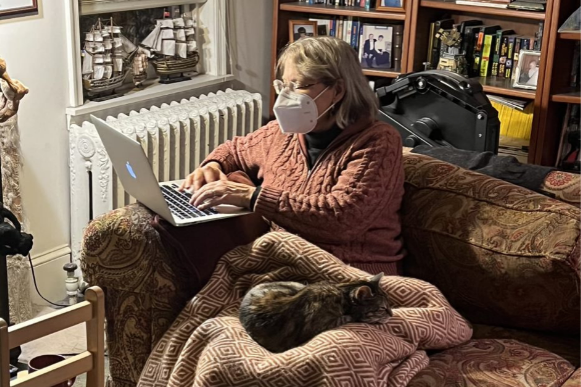 Kate recuperating at home with her cat