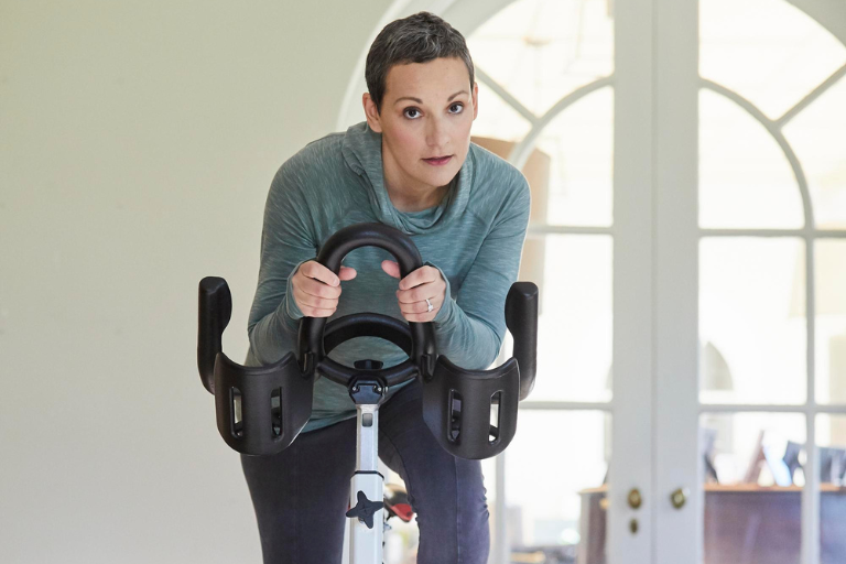 Woman on stationary bike