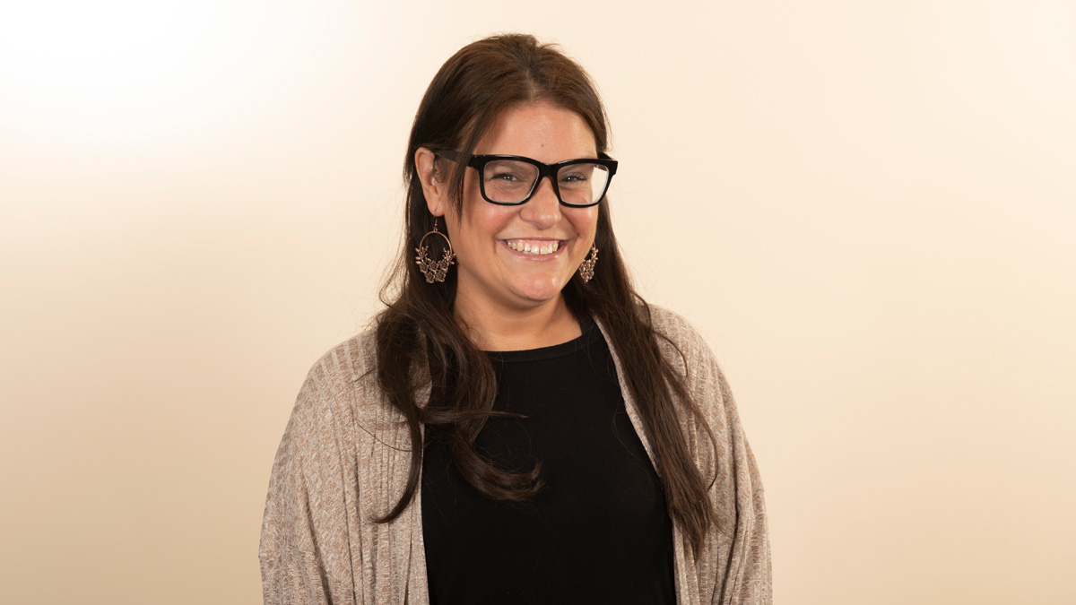 A young white woman smiling