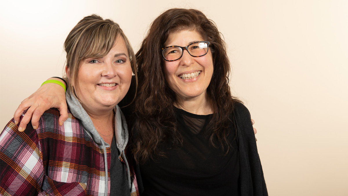 Two women at the 2023 Conference for Metastatic Breast Cancer