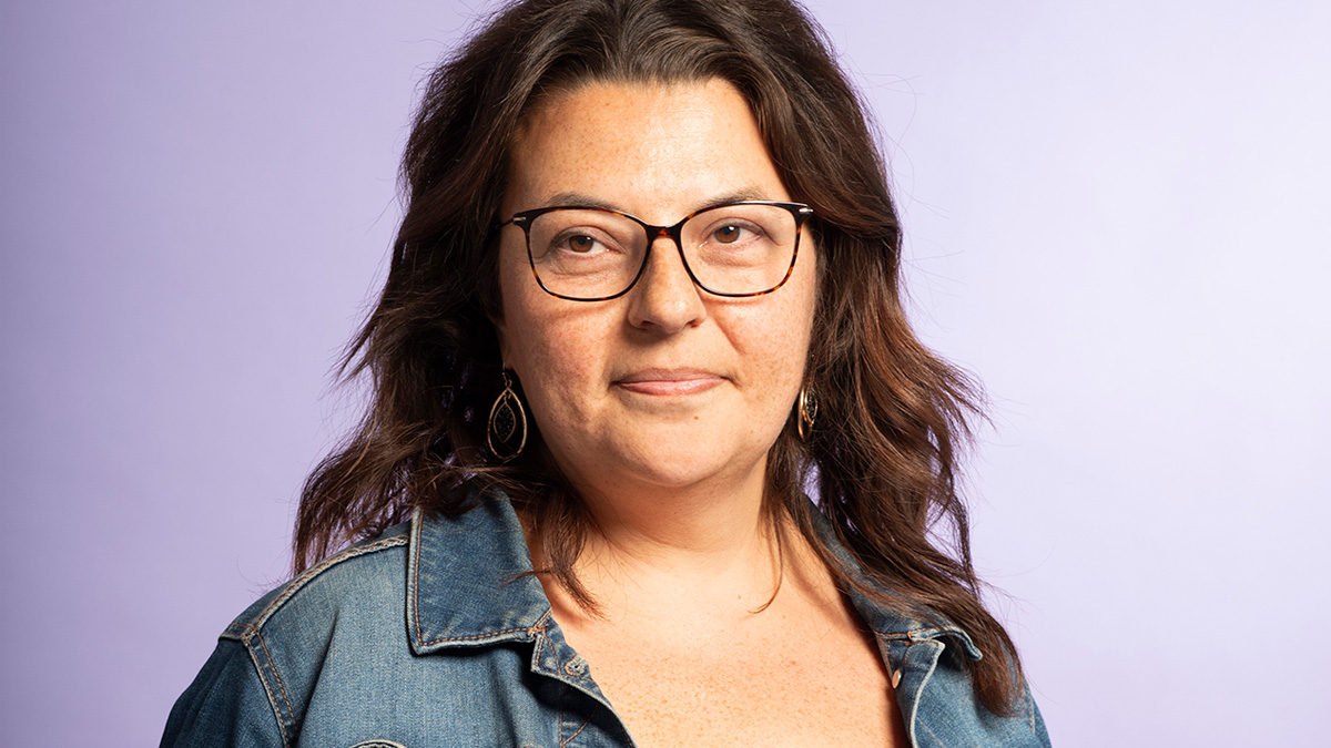 A White woman with a stoic look