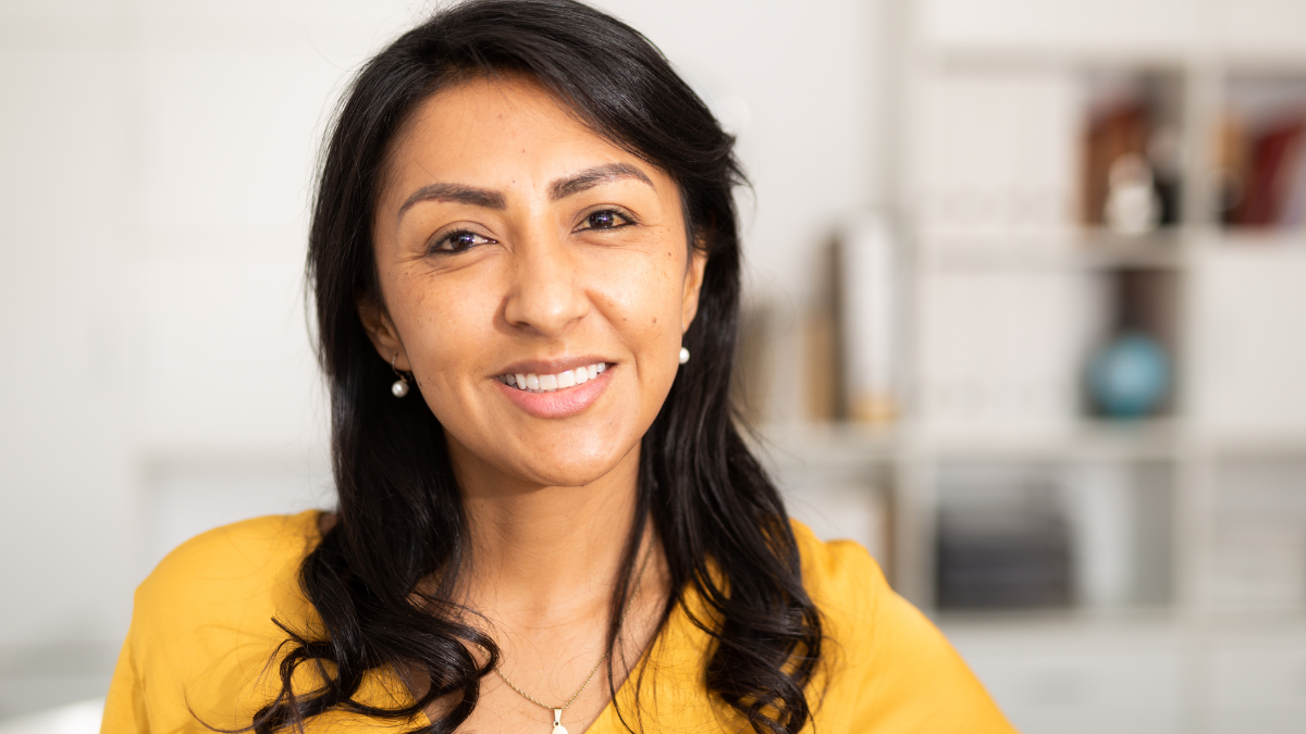 An Indian woman smiling