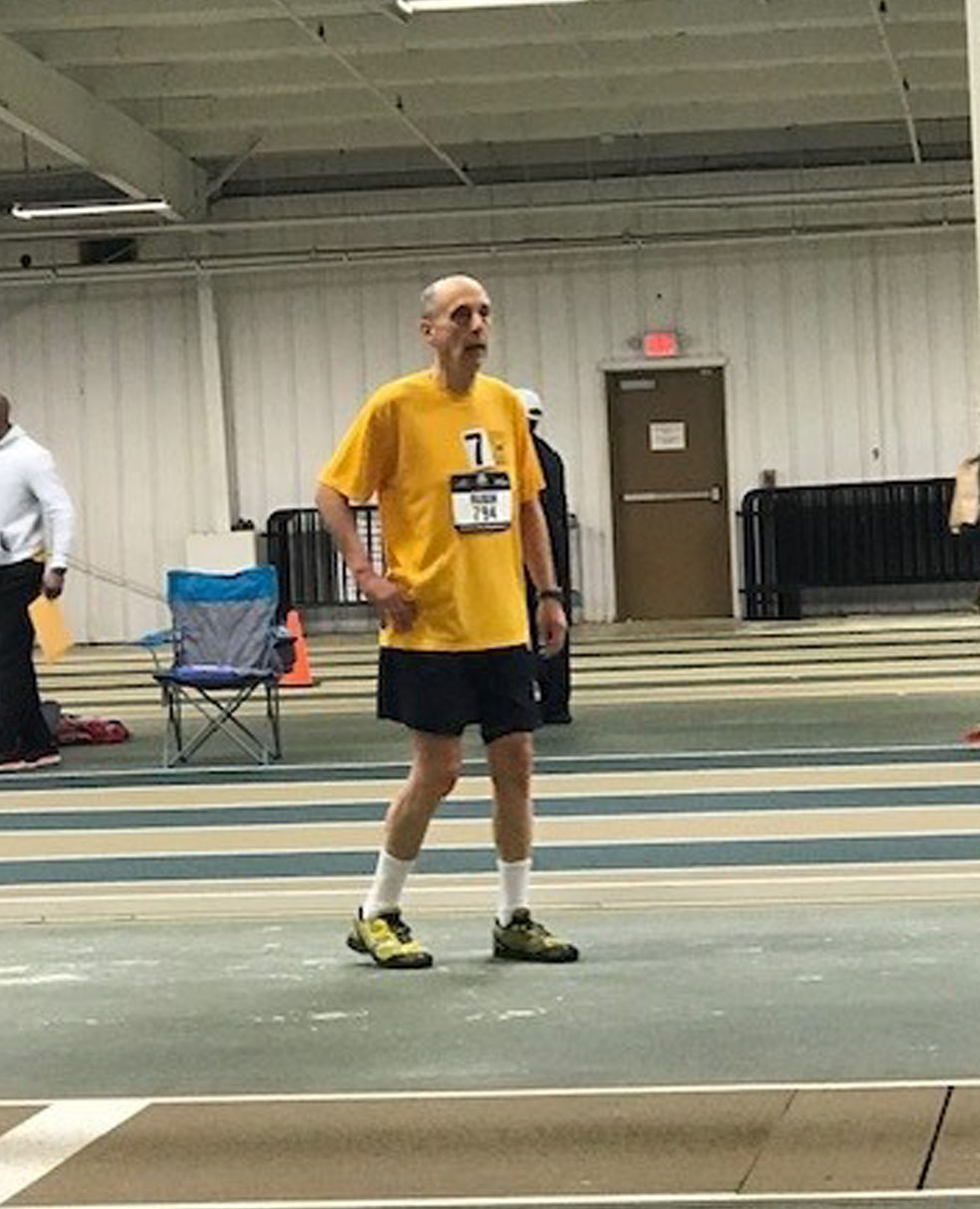 Bruce Rubin paces the basketball court, waiting for his chance to catch a pass.
