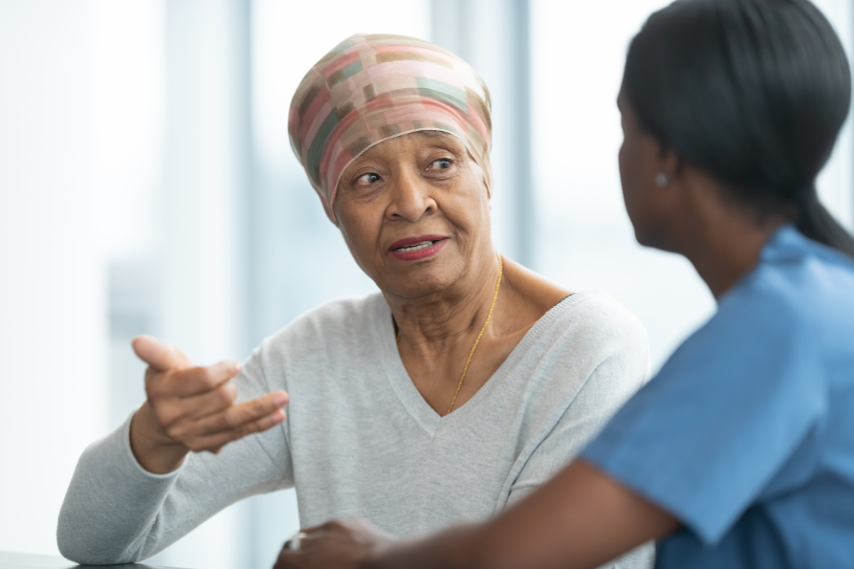 Woman asking doctor questions