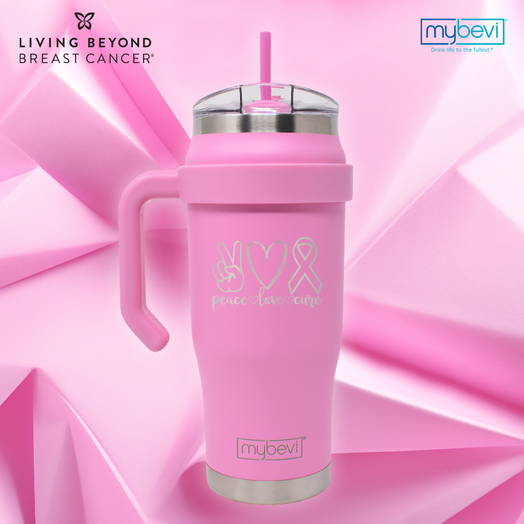 pink metallic mug with a handle and straw