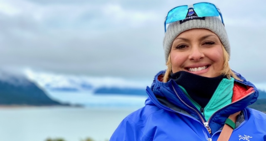 Gillian Lichota smiling in cold-weather outdoor gear