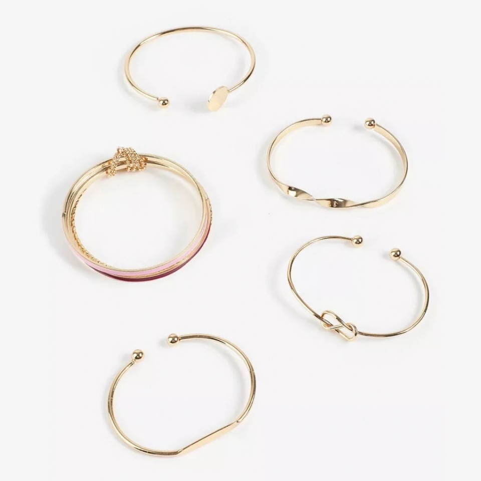 5 pink and gold tone bracelets