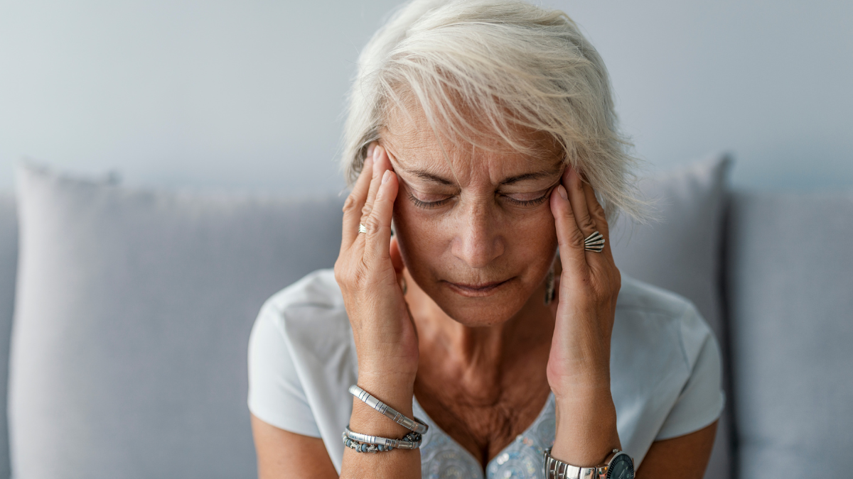 Older white woman looking stressed
