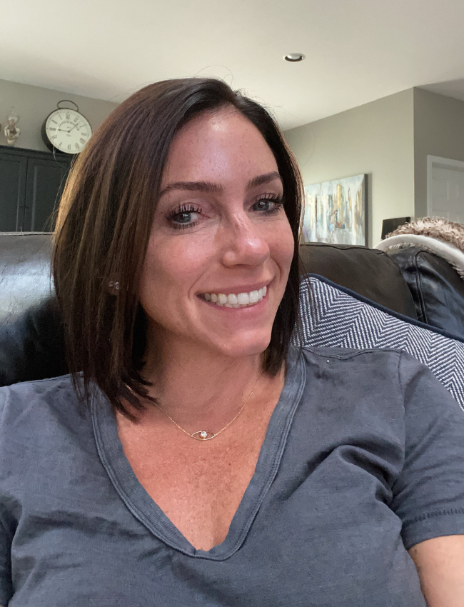 Alexis post-chemotherapy, with medium-length brown hair