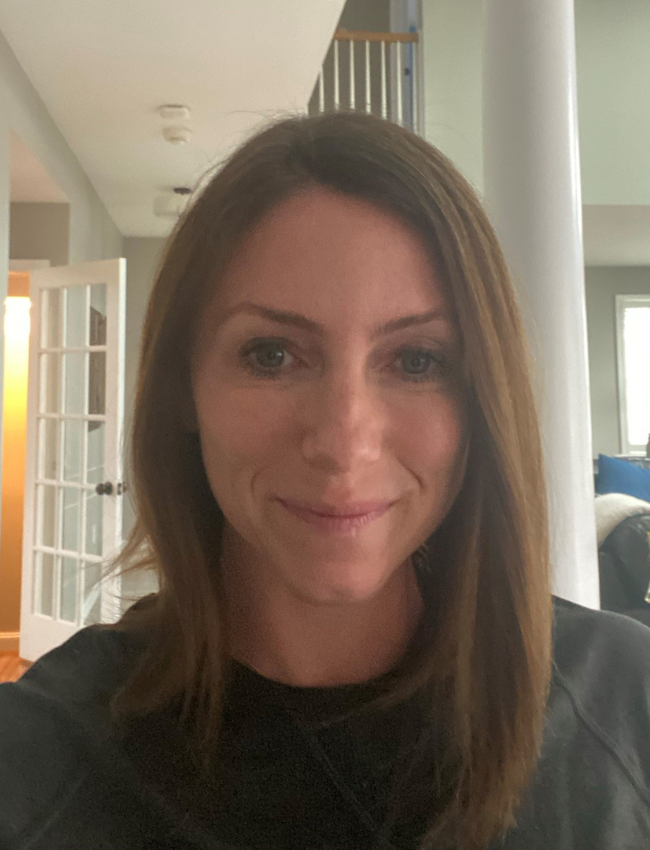Alexis, a white woman with medium-length brown hair, before her chemotherapy treatments