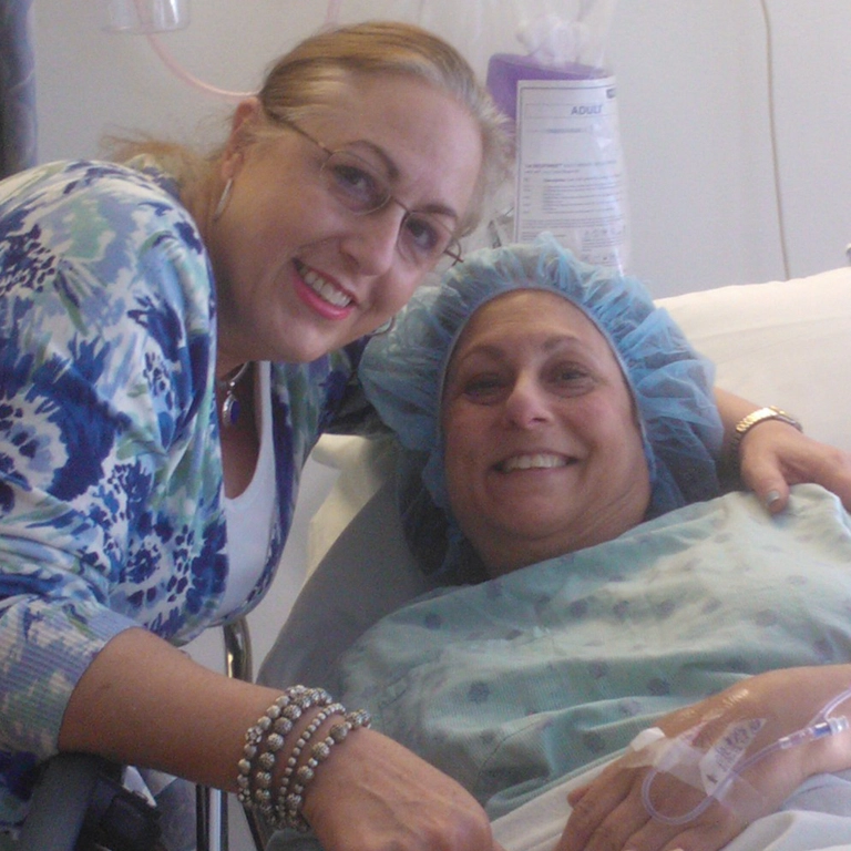 Diane getting ready to go into surgery, with her sister beside her.
