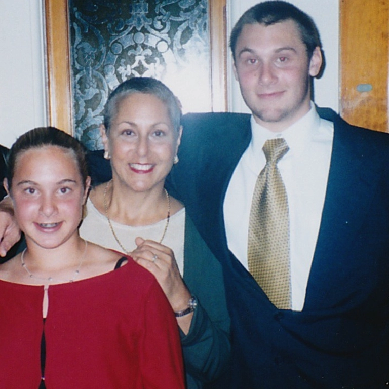 Diane with her kids. Everyone's hair is starting to grow back.