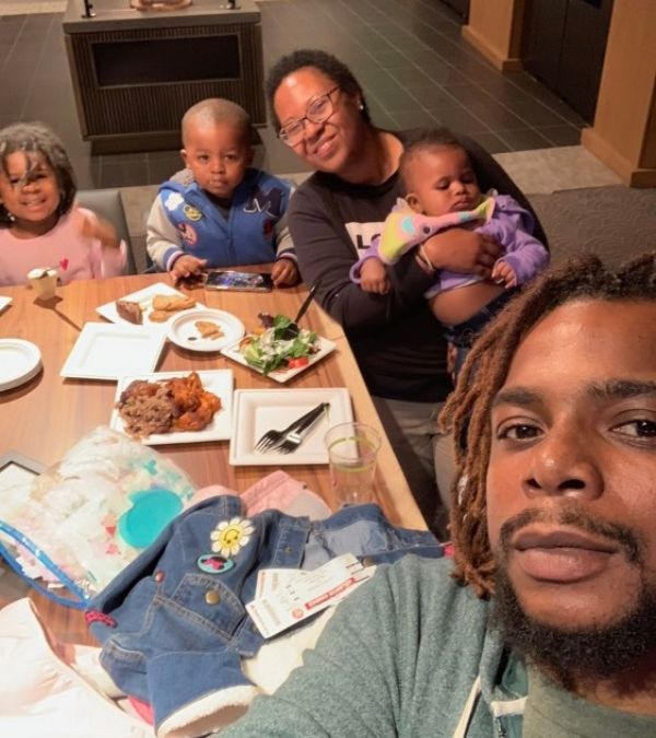 Cheryl and her family at the dinner table