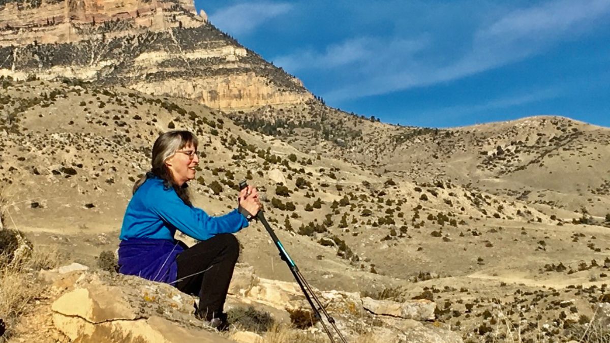 Mary Evelyn Burman rests after a long hike.