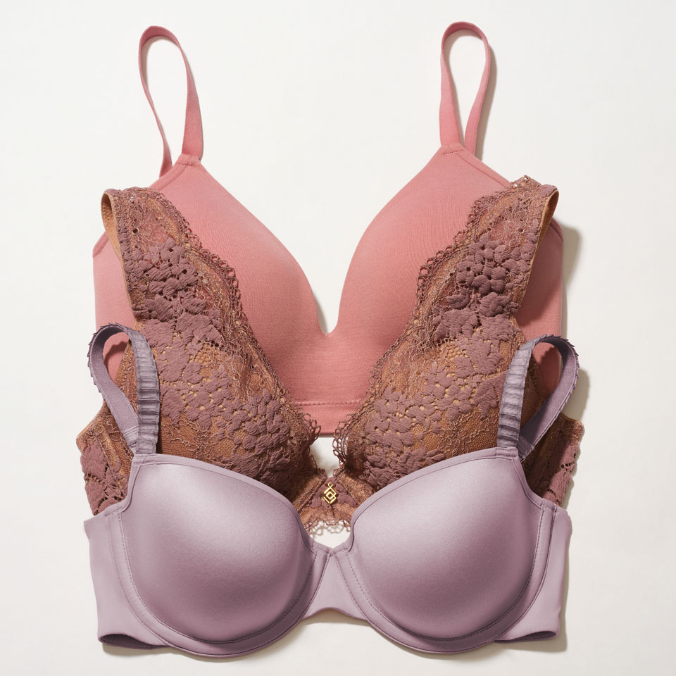 Three different colored bras