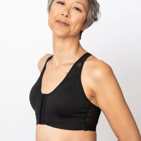 Woman wearing black Bianca sports bra by AnaOno