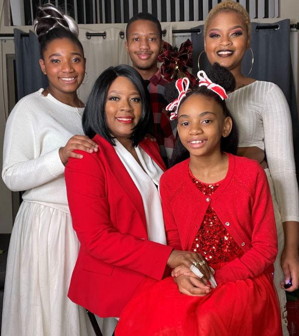 Eboney Thompson and her family in a festive portrait