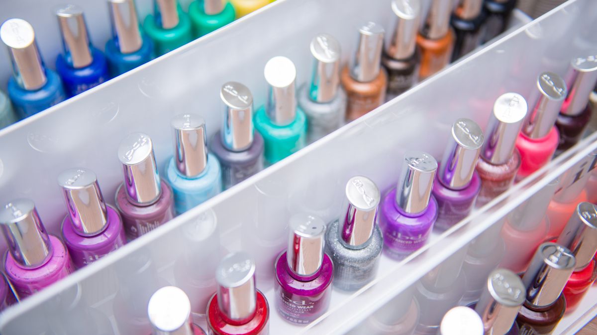A rack of colorful nail polishes