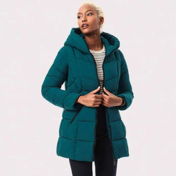 Woman wearing Bernardo puffer jacket in teal