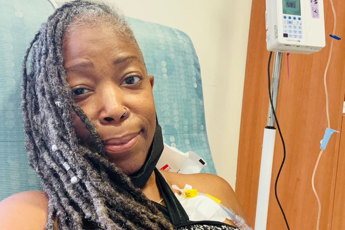 Nancy sits in a chemo infusion chair