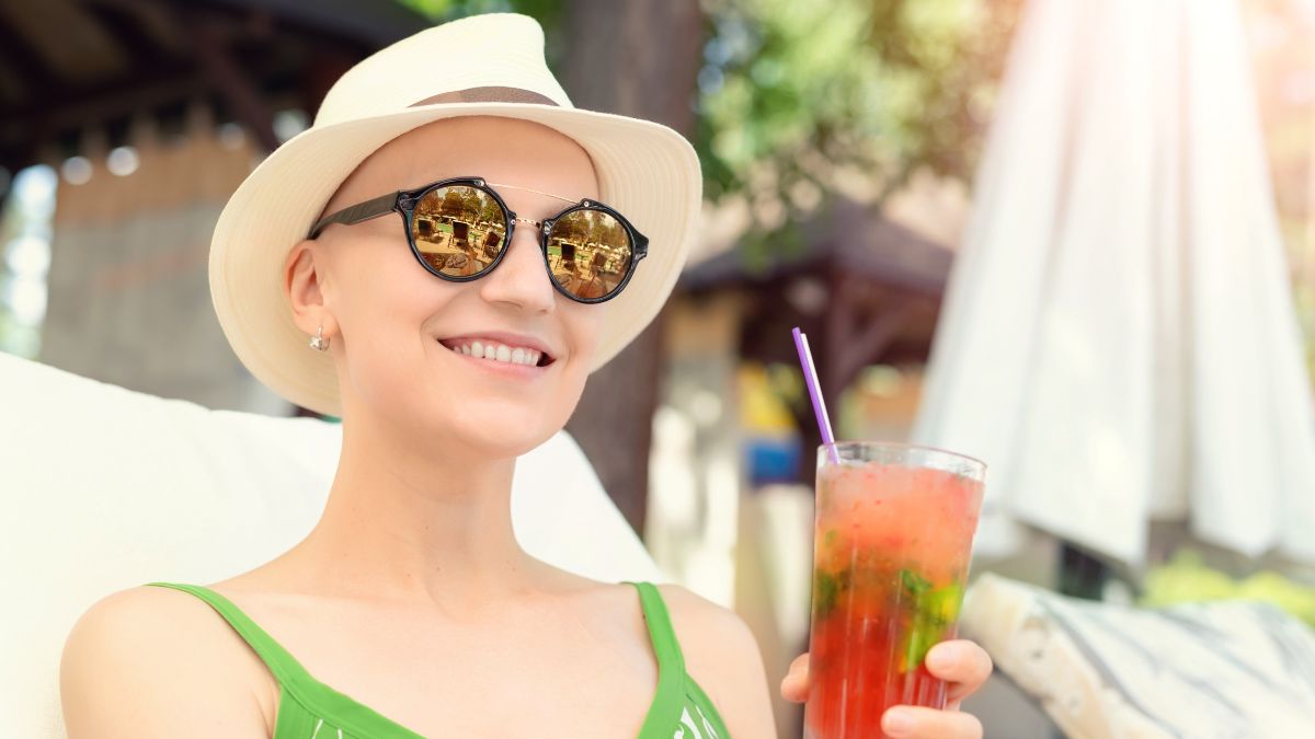 woman holding a cocktail