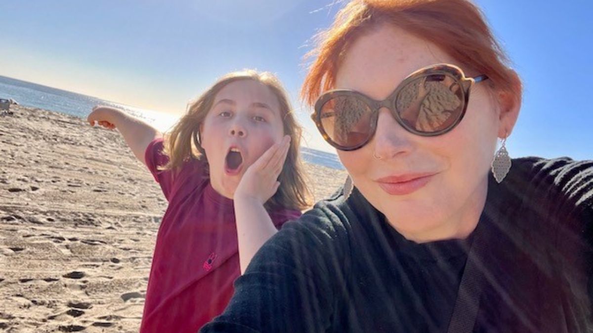 Lauren Izzo and her young son pal around at the beach