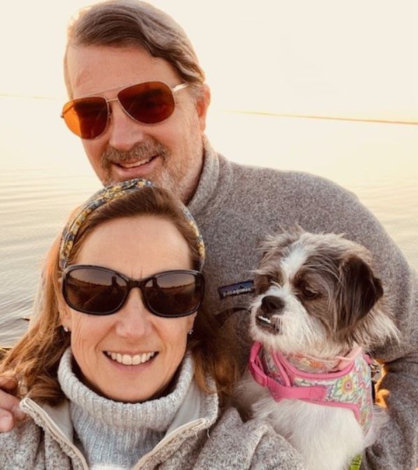 Laura-Lynn, her husband, and puppy CJ take a selfie at the beach