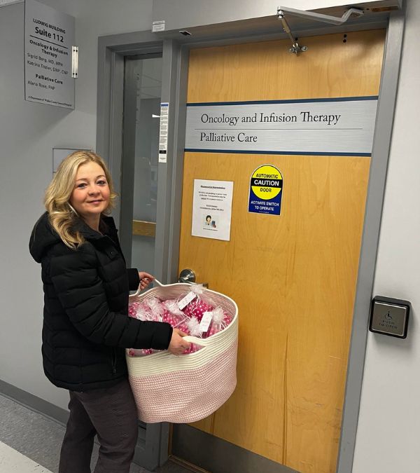 Jamie Gallagher donates her masectomy pillows to the hospital.