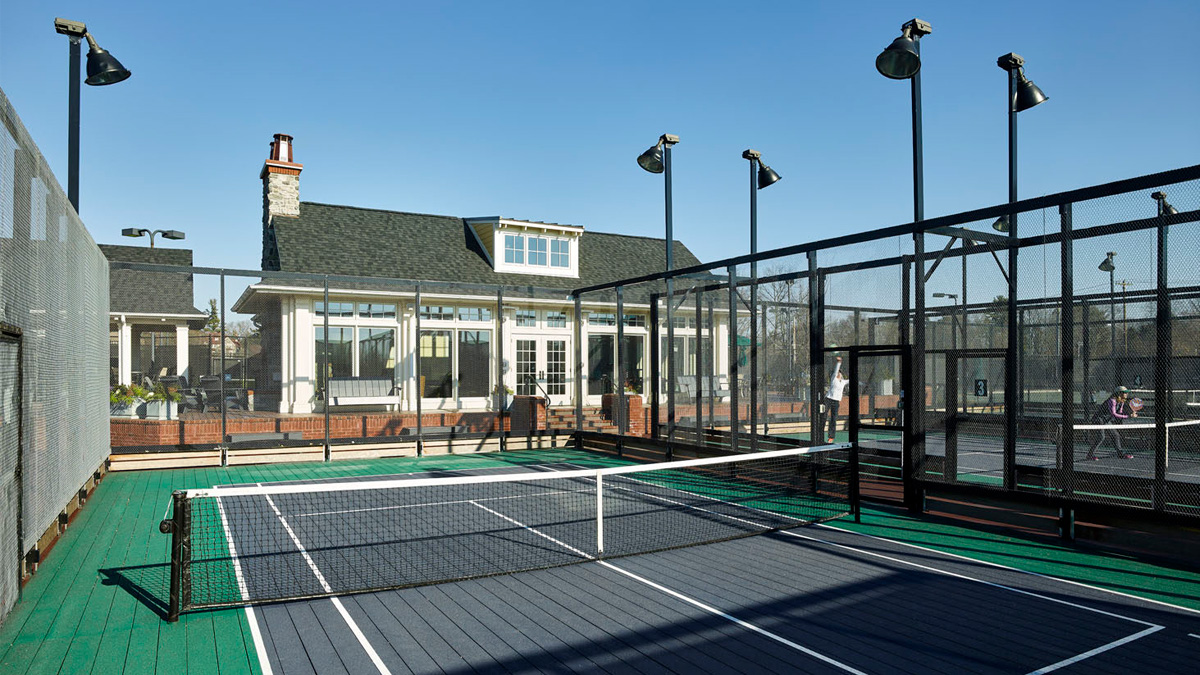 A blue, outdoors paddle ball court