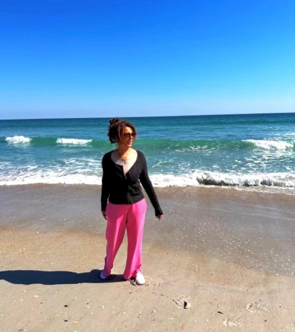 Dede Delaney enjoys the peace of the beach with a walk.