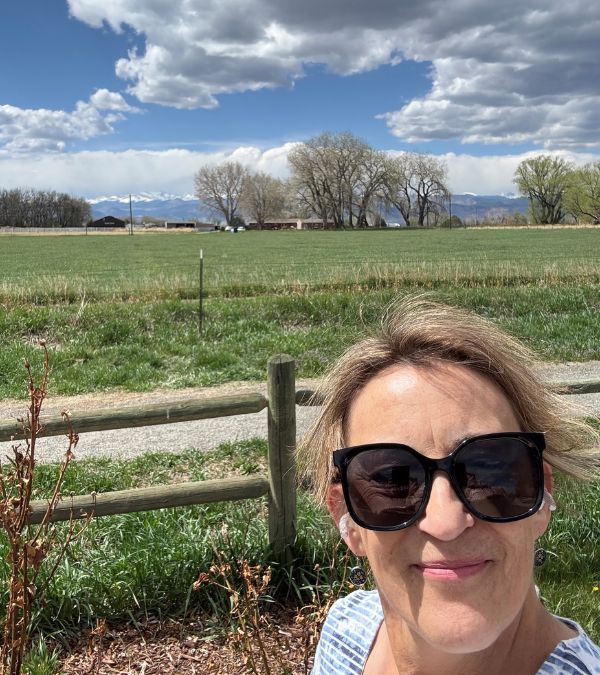 Donna Charlevoix wants us to see the big fluffy clouds and majestic mountains of Colorado that frame her morning walk.