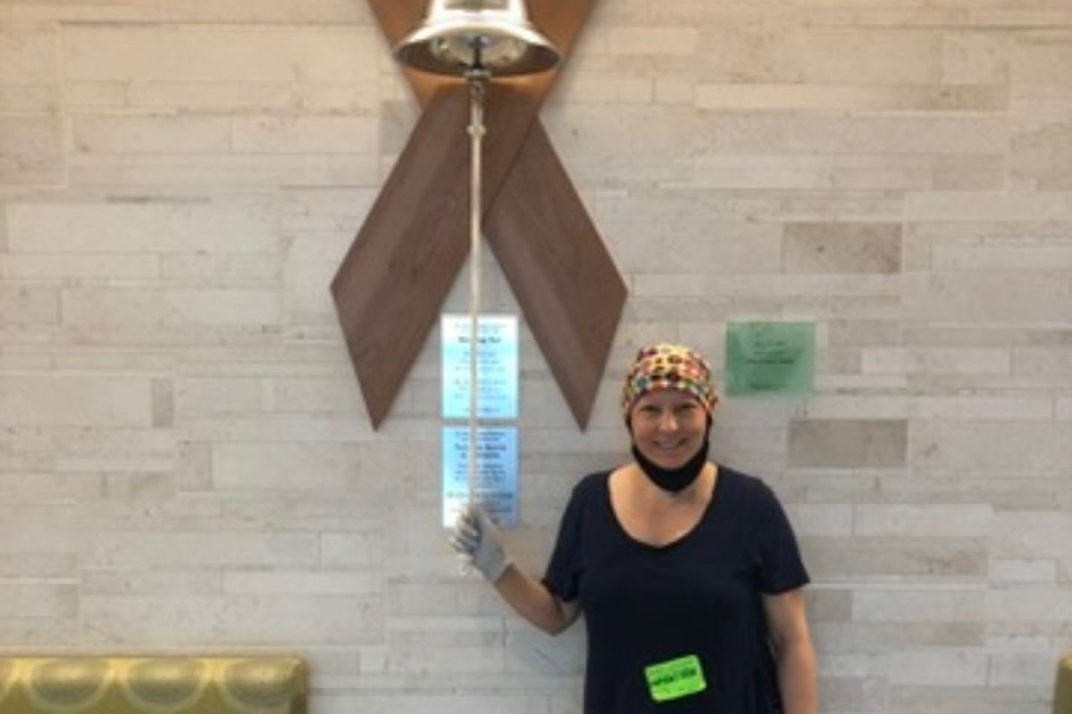 Chemo #8. Mira finished her last chemotherapy infusion and rang the bell.