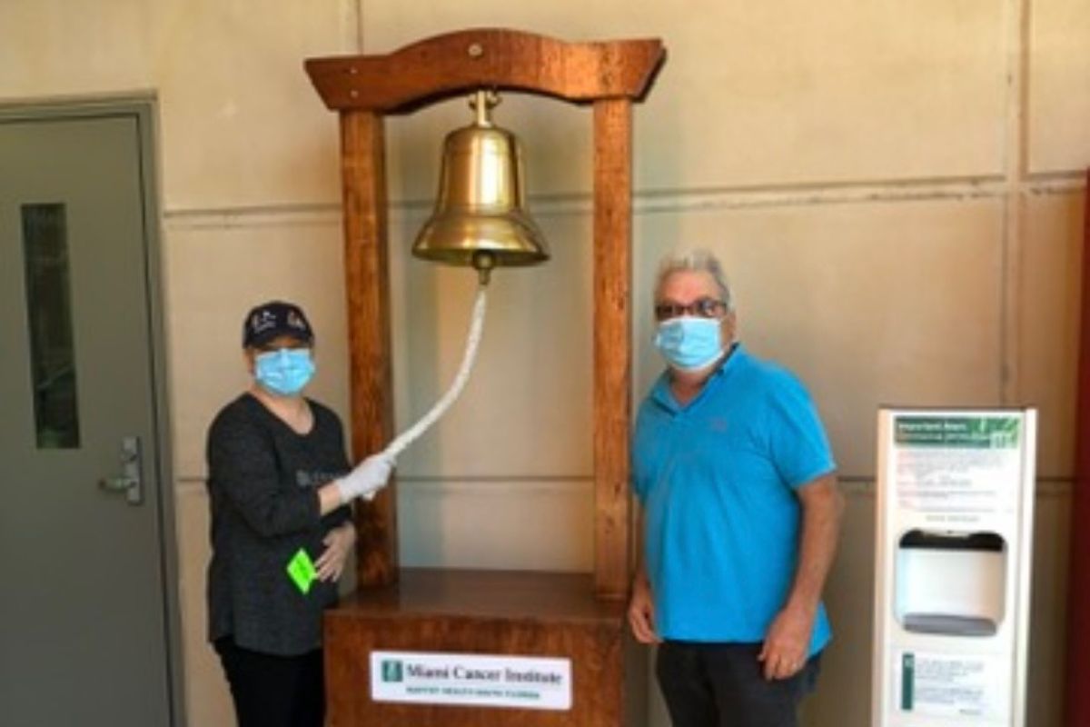 Maria rings the radiation bell, her radiation treatment now complete.