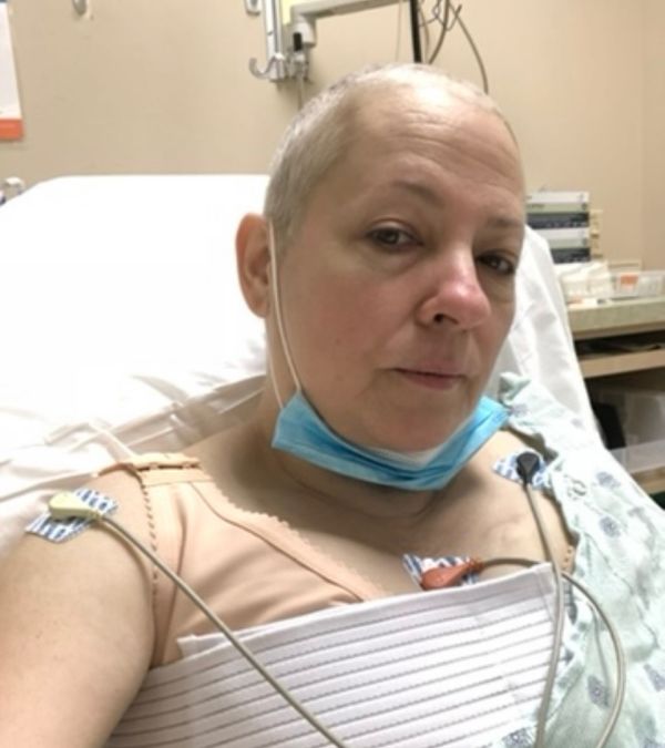 Maria Lleonart checks on herself after surgery.