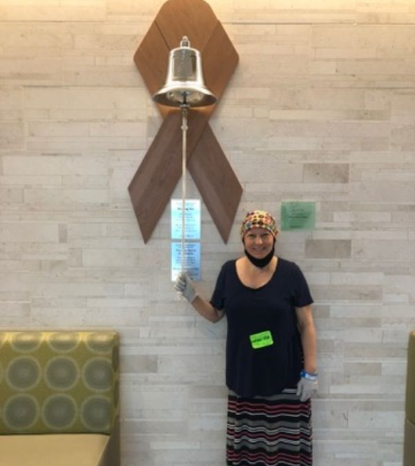 Maria Lleonart rings the bell for her last chemo treatment.