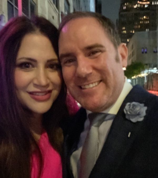 Jordana Shief Needle and her husband Jarrod attend a gala with happy smiles and formal wear.