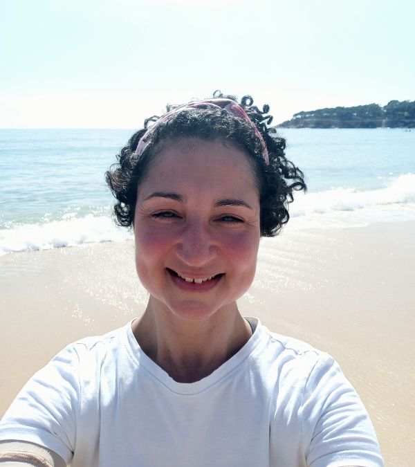 Virginia de Oliveira Marques enjoys a sunny day at a beautiful beach.