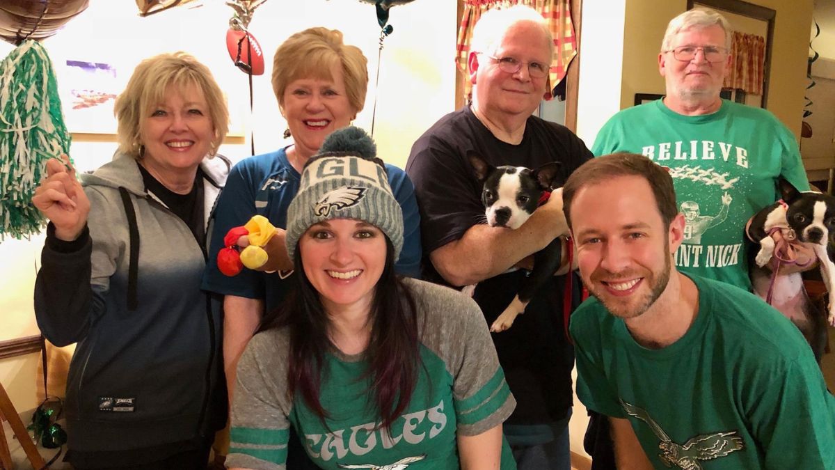 Jeanmarie Mason and her family are ready to cheer on the Eagles Football Team in their green Eagles merchandise.