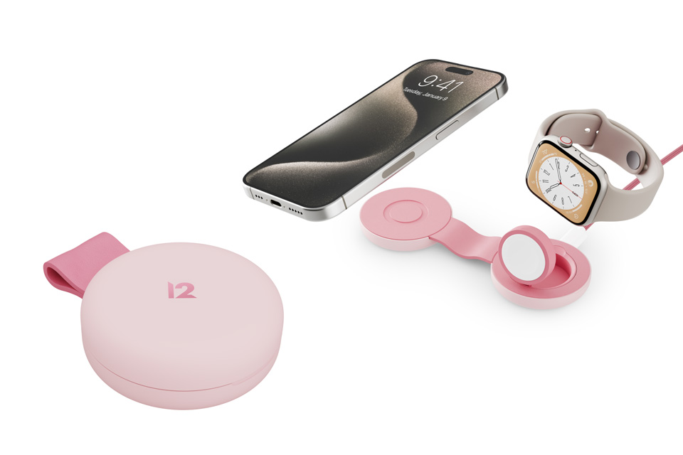 An iPhone, Apple watch, and two of the Pink wireless chargers