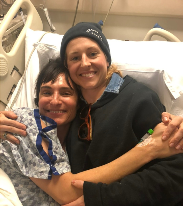 Chelsey hugging a friend in the hospital