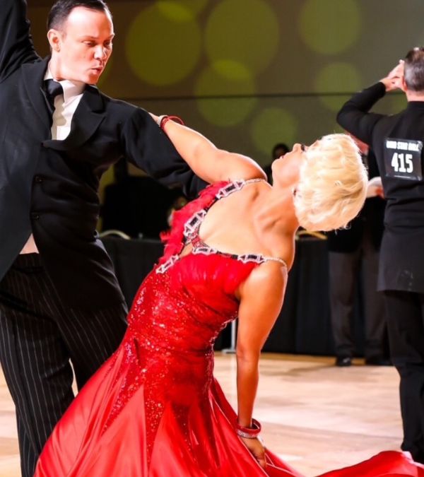 Courtney Bugler is dipped elegantly in a waltz move as she glides across the dance floor.