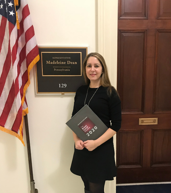 Caroline standing outside Representative Madeleine Dean's office