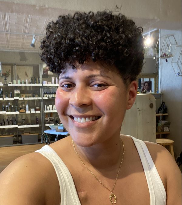 Amara Brown posing in a selfie with a new haircut.