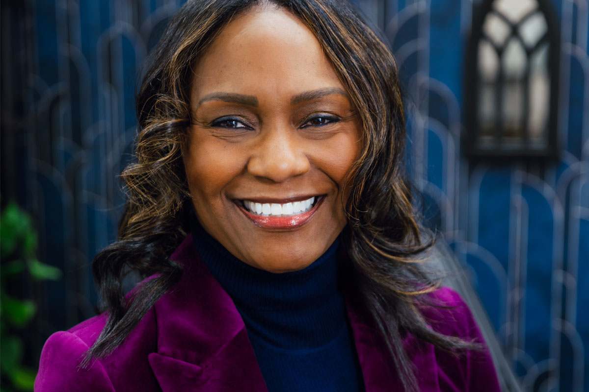 Breast cancer patient Ivy Johnson sits for a portrait.
