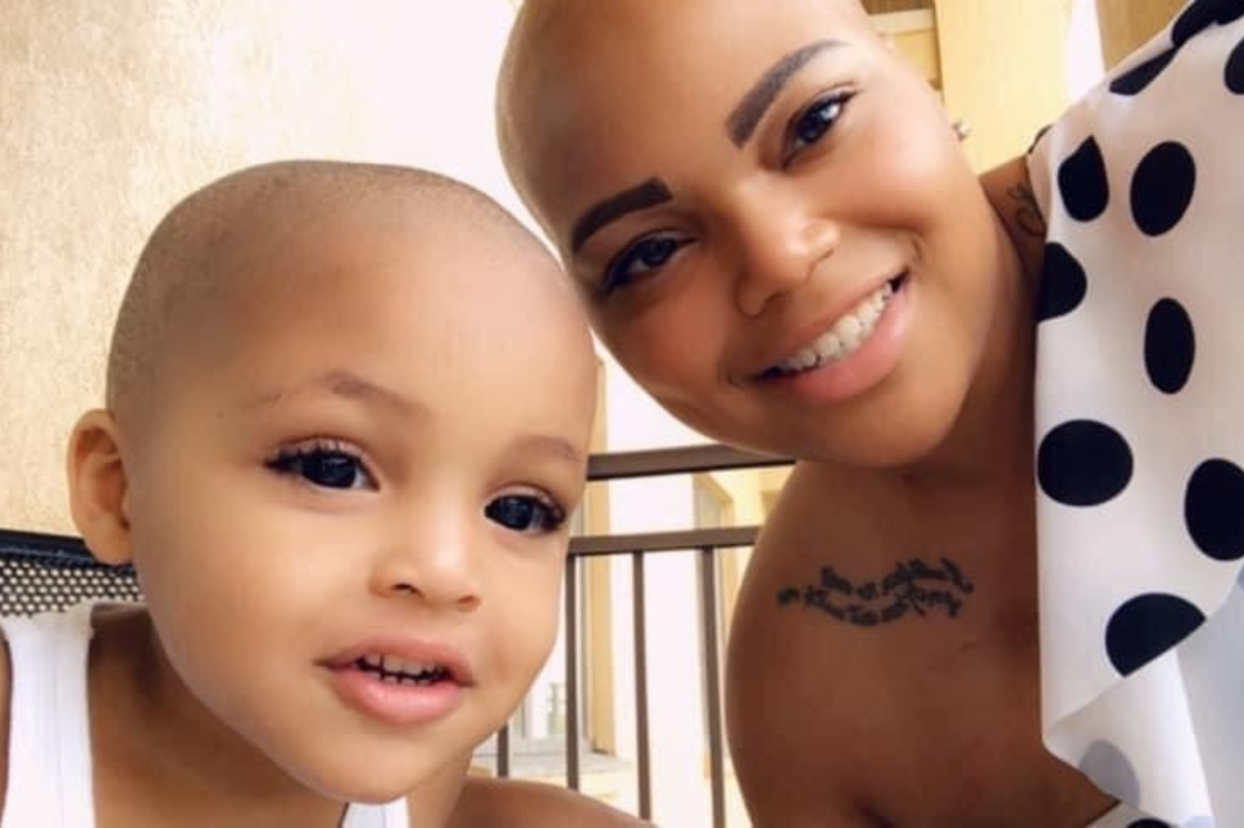 Tiana Russell smiling with her son