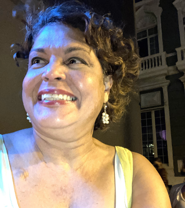 Betty Sanchez smiling brightly.