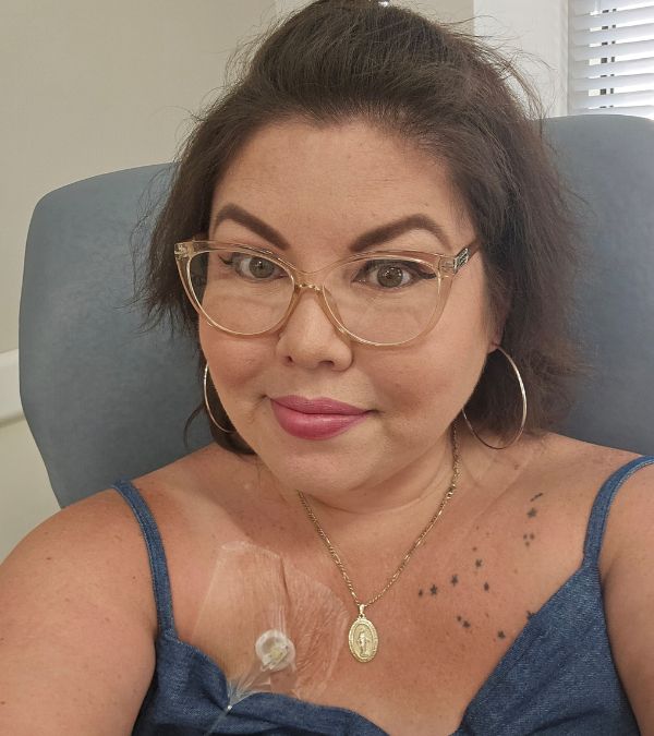 Deb Ontiveros sits in a chemo infusion chair.