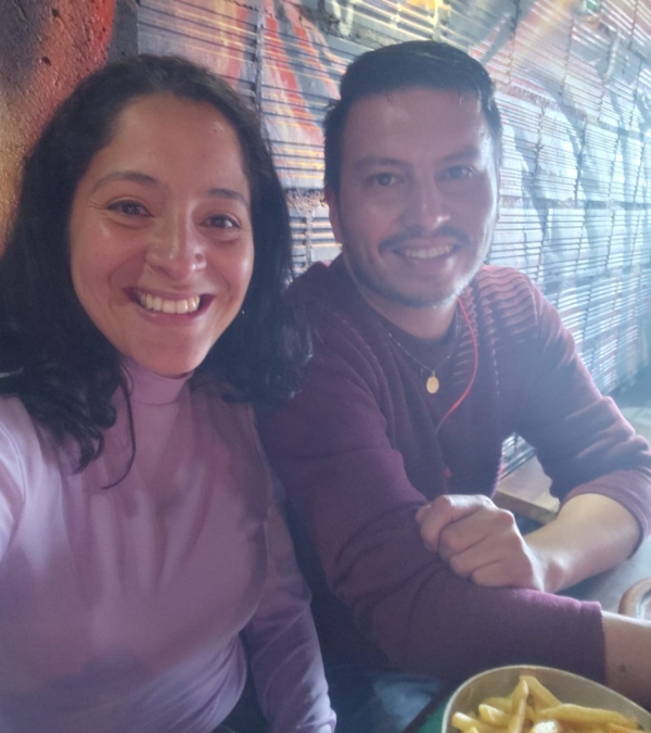 Gynna Quintero and her boyfriend Diego on a date at a restaurant.